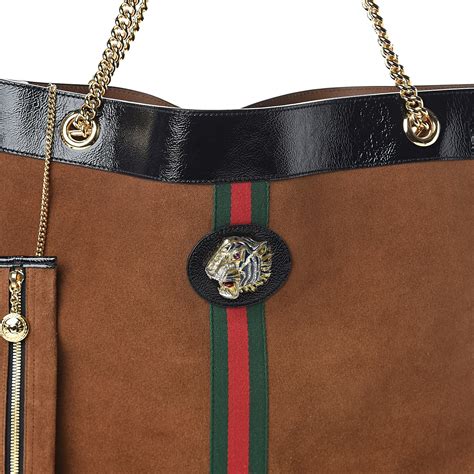 gucci brown suede bag.